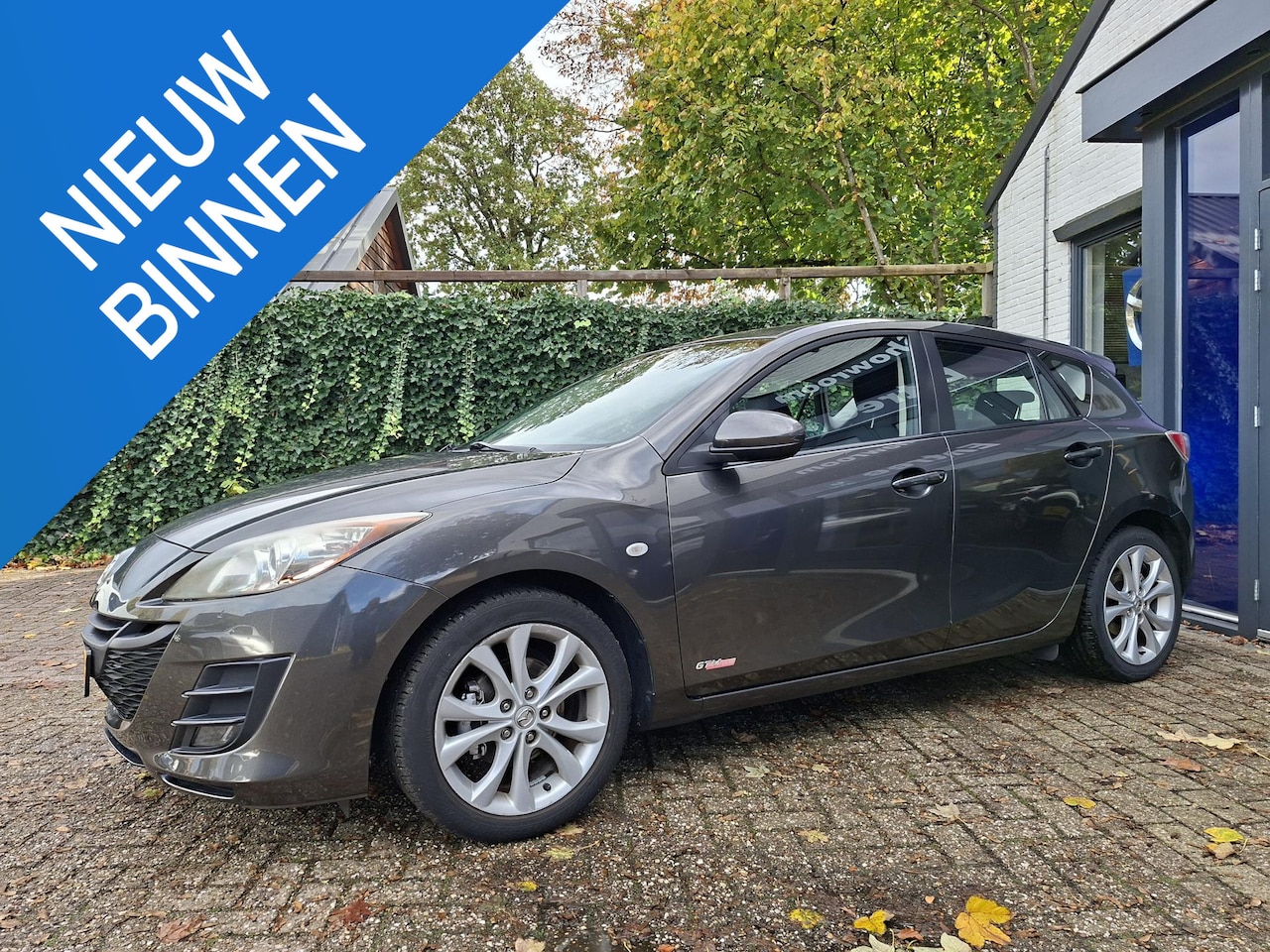 Mazda 3 - 1.6 GT-M Line Cruise, trekhaak - AutoWereld.nl