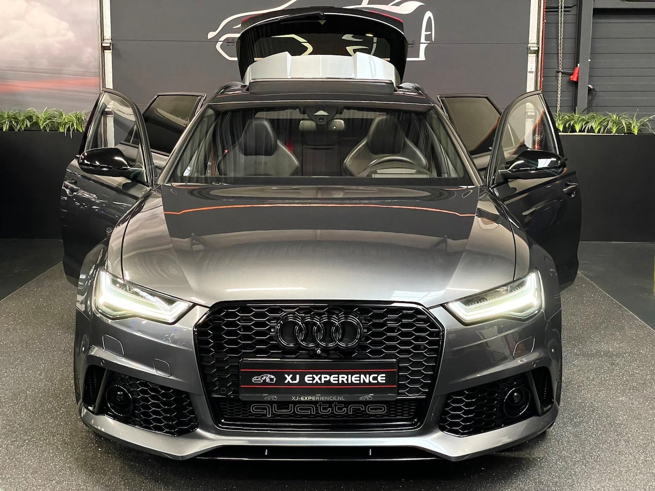 Audi A6 Avant - 4.0 TFSI RS 6 quattro CERAMIC 21" CARBON PANO HUD Milltek Sport - AutoWereld.nl