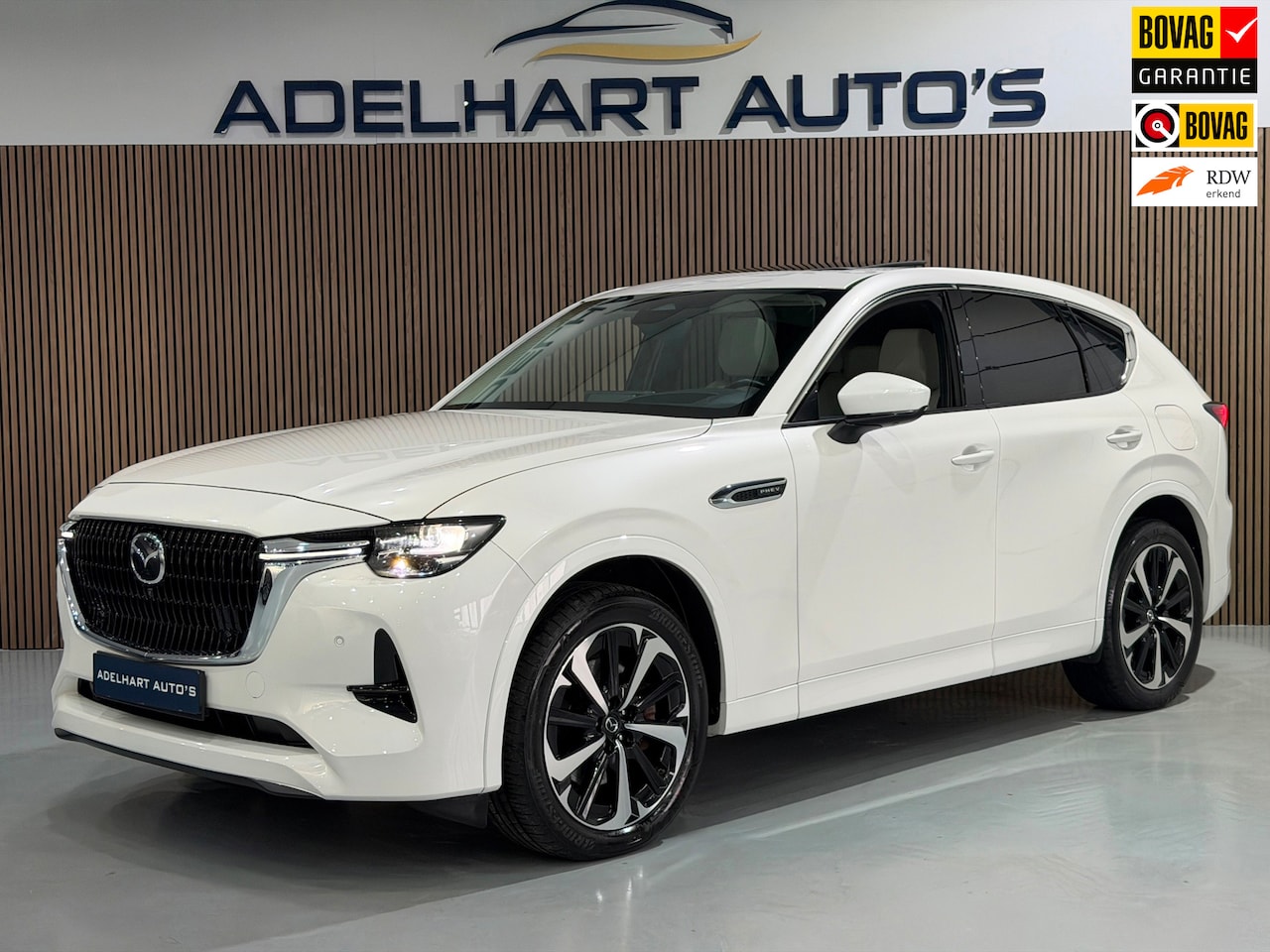 Mazda CX-60 - 2.5 e-SkyActiv PHEV Takumi 327 PK / Panorama dak / Exclusive Lederen interieur / Elektrisc - AutoWereld.nl