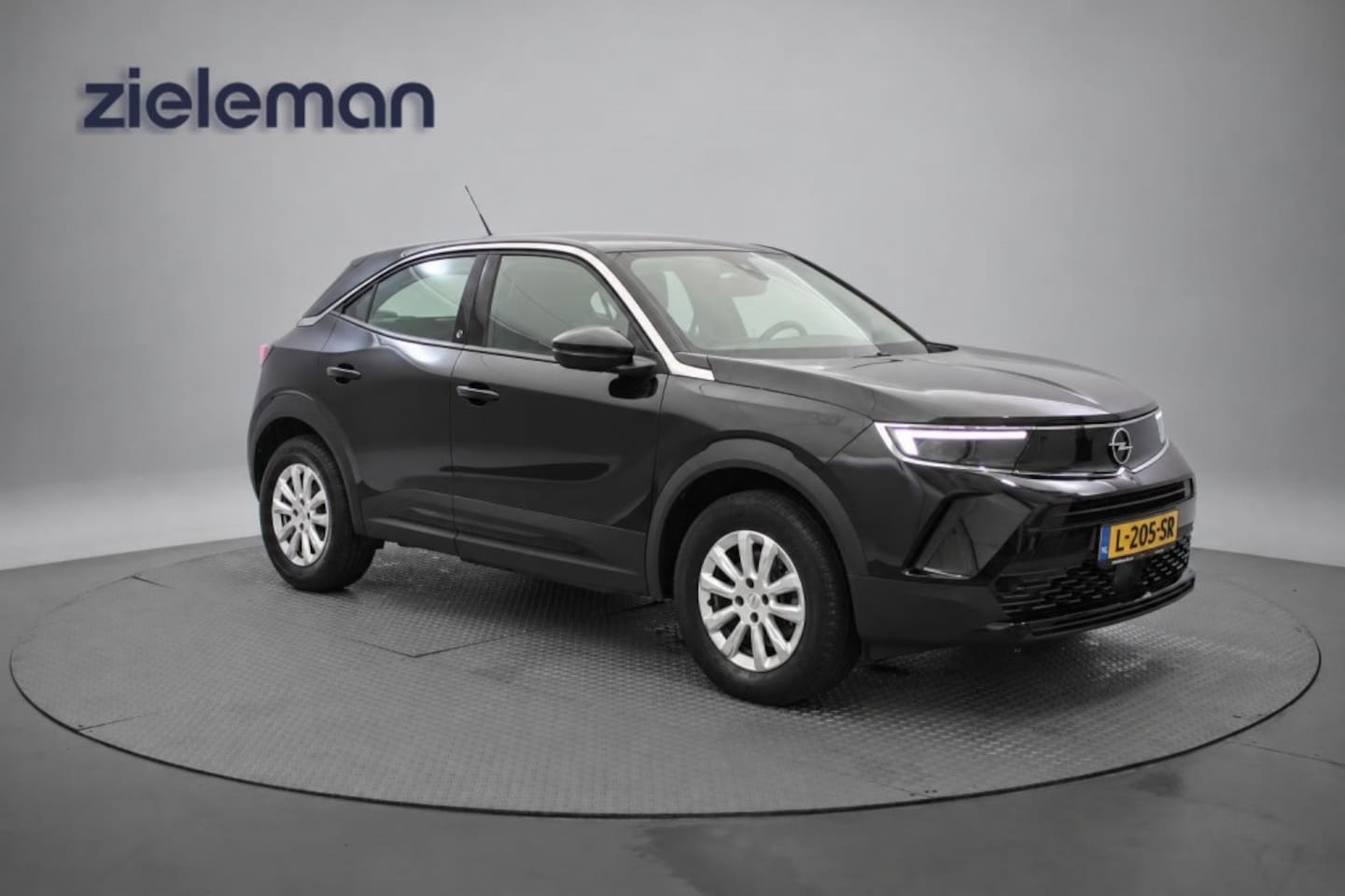 Opel Mokka-e - Edition 50-kWh - Carplay, Camera, Cruise, Clima, SOH 90,81% - AutoWereld.nl