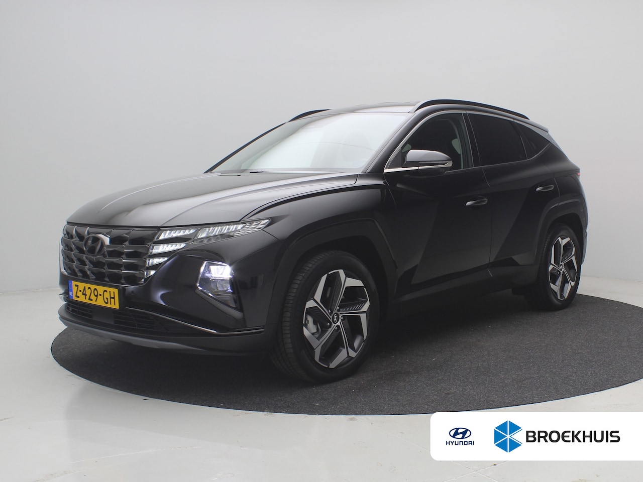 Hyundai Tucson - 1.6 T-GDI 265pk PHEV Premium 4WD | Leder | Carplay | Climate | Keyless | Navigatie | Elek. - AutoWereld.nl