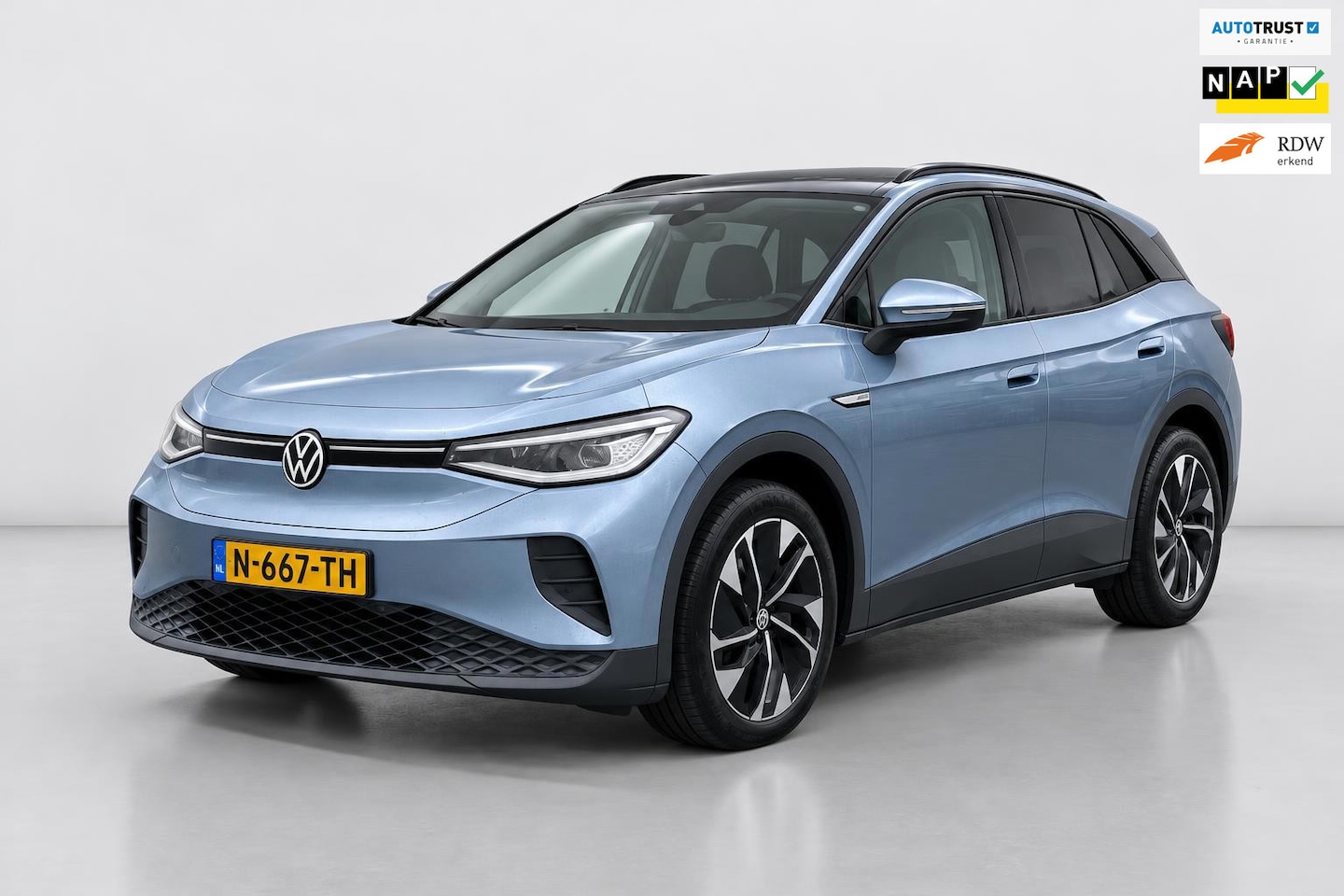 Volkswagen ID.4 - Pro 77 kWh LEER PANO TREKHAAK 97% SOH FASE 3 WARMTEPOMP - AutoWereld.nl