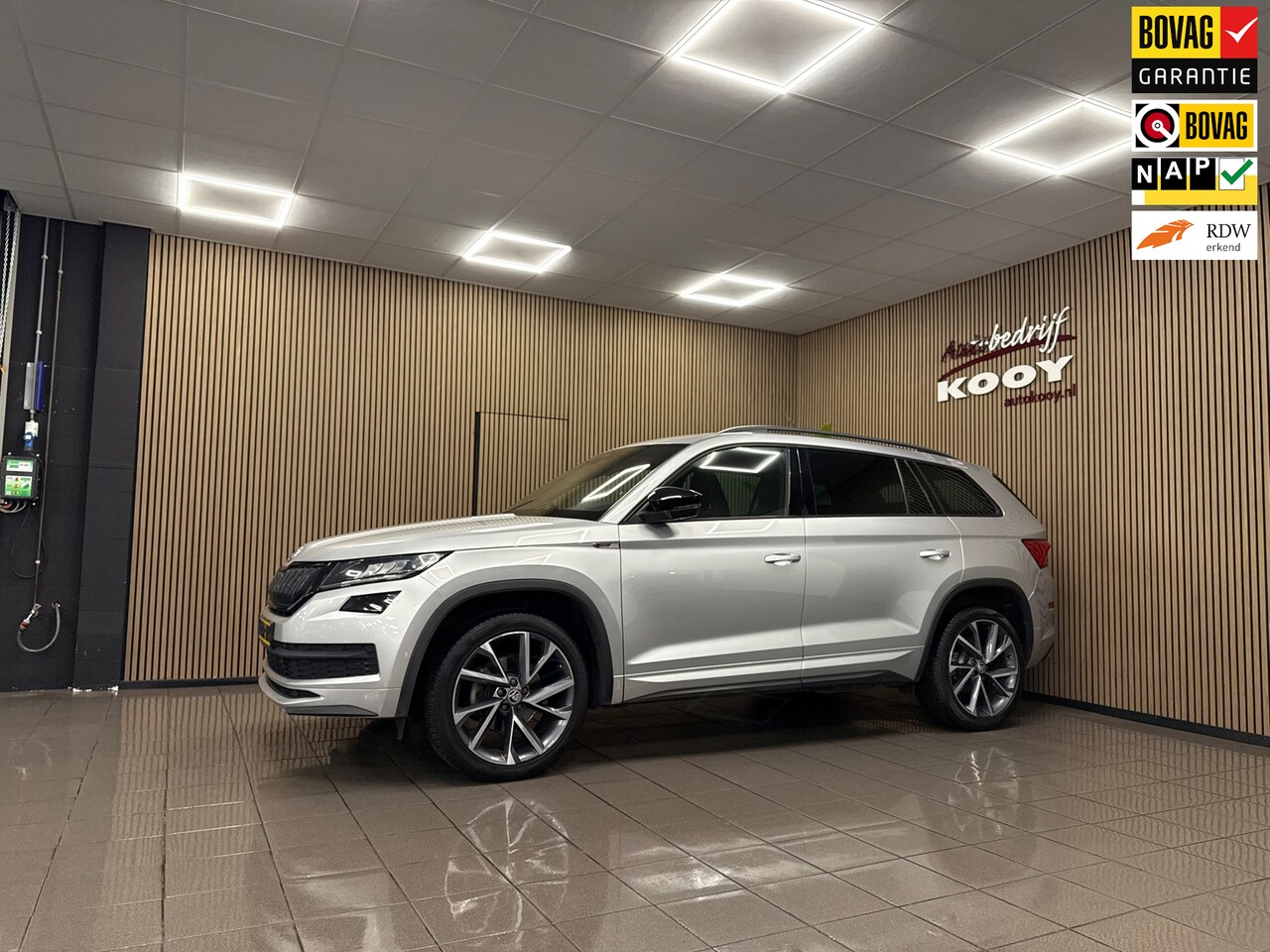 Skoda Kodiaq - 1.5 TSI Sportline Business * Automaat / Panoramadak / Afn. Trekhaak / Carplay / NL Auto * - AutoWereld.nl