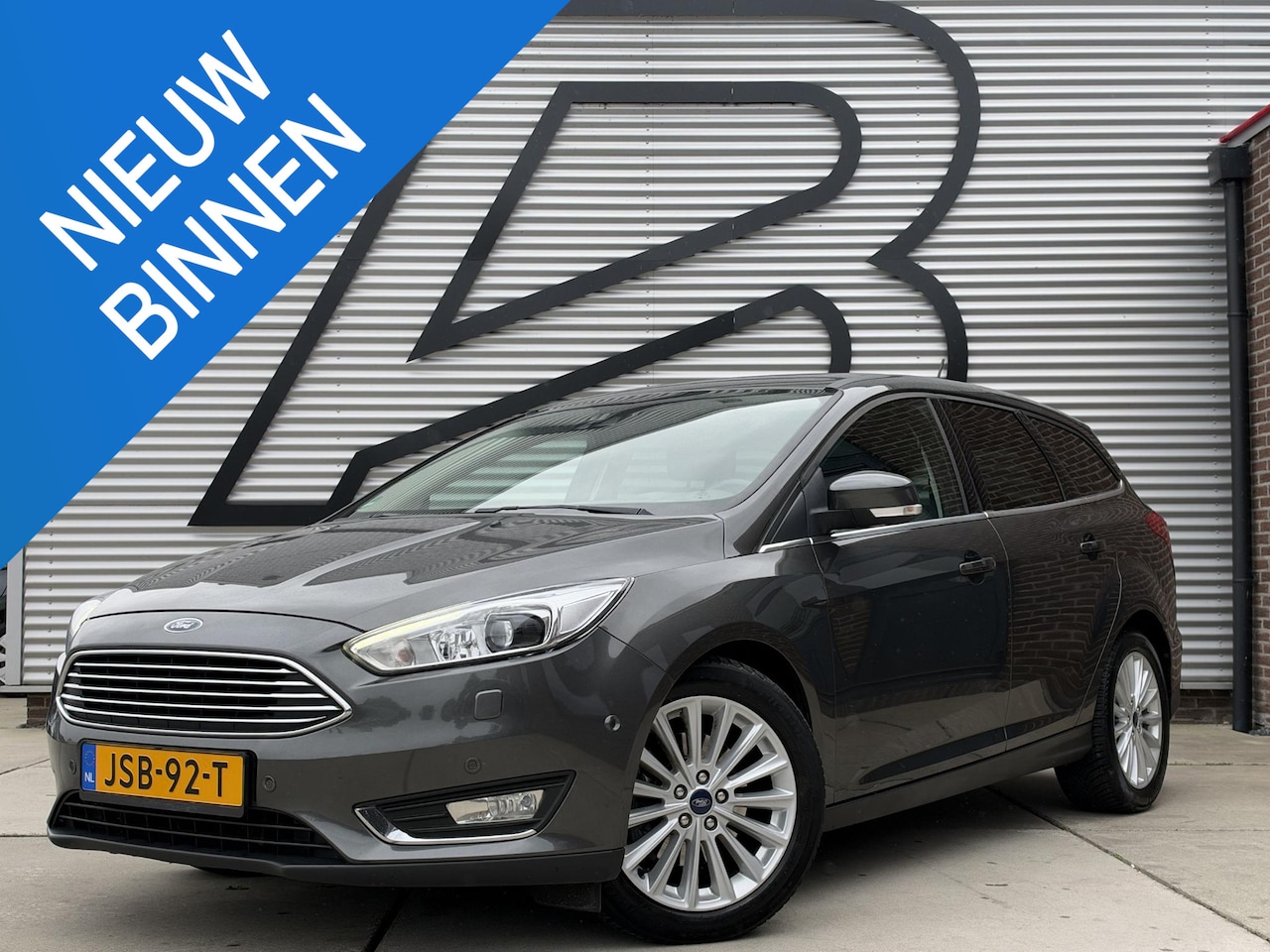 Ford Focus Wagon - 1.5 Titanium 1e Eigenaar|Navi|Clima|Cruise|PDC V+A|Sony Sound|Stoelverwarming|APK tot 01-2 - AutoWereld.nl