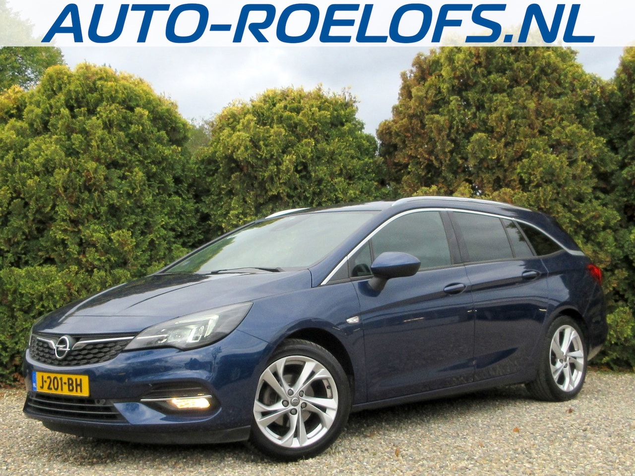 Opel Astra Sports Tourer - 1.2 Edition * Navi * Camera * Trekhaak * - AutoWereld.nl