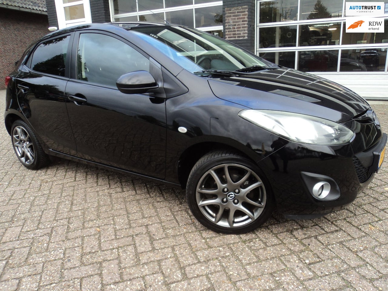 Mazda 2 - 1.3 TS Plus Stoelverwarming Airco - AutoWereld.nl