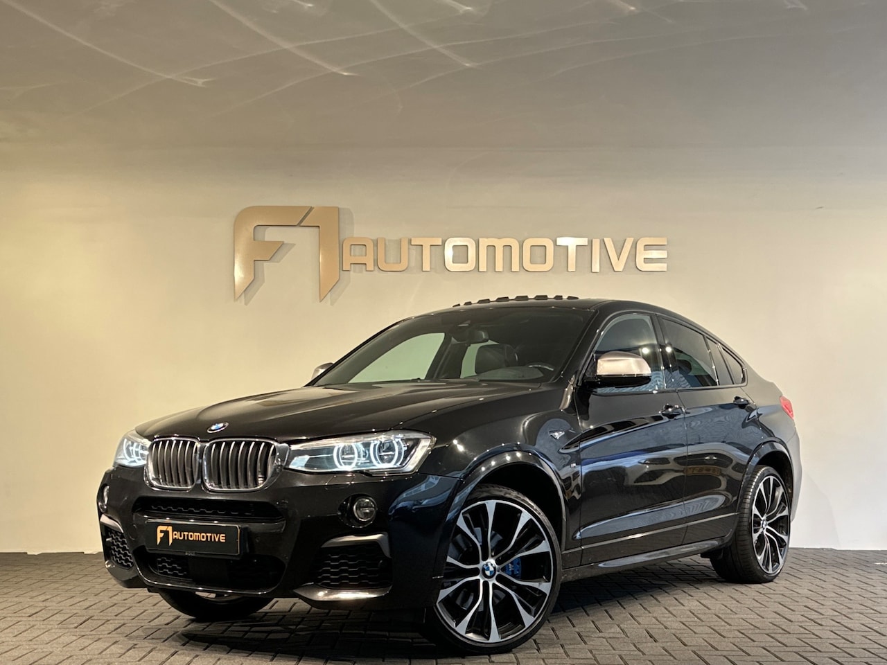 BMW X4 - M40i M Sport Pano|H/K|HuD|Camera|Stoelverwarming - AutoWereld.nl