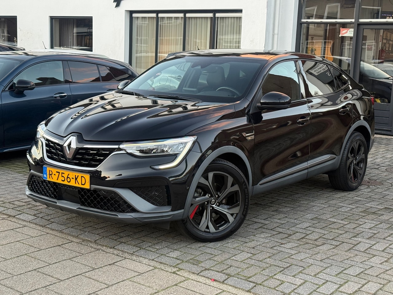 Renault Arkana - 1.6 E-Tech Hybrid 145 R.S. Line, Panoramadak,Stoelverwarming,Stuurverwarming,Apple Carplay - AutoWereld.nl