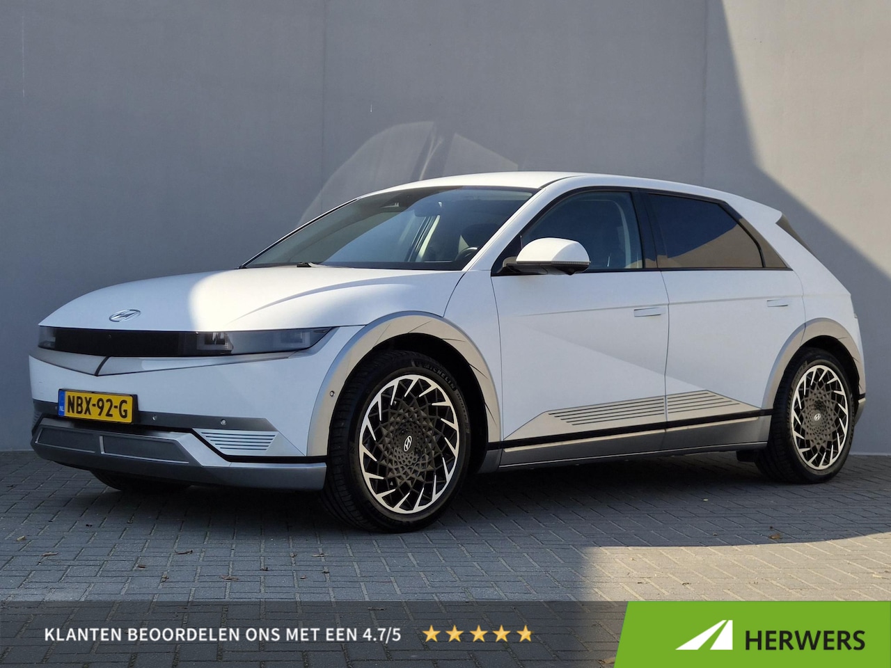 Hyundai IONIQ 5 - Lounge 77.4 kWh / SOH 99% / Fabrieksgarantie tot 07-2028 / Dealer onderhouden / 1.600 kg a - AutoWereld.nl