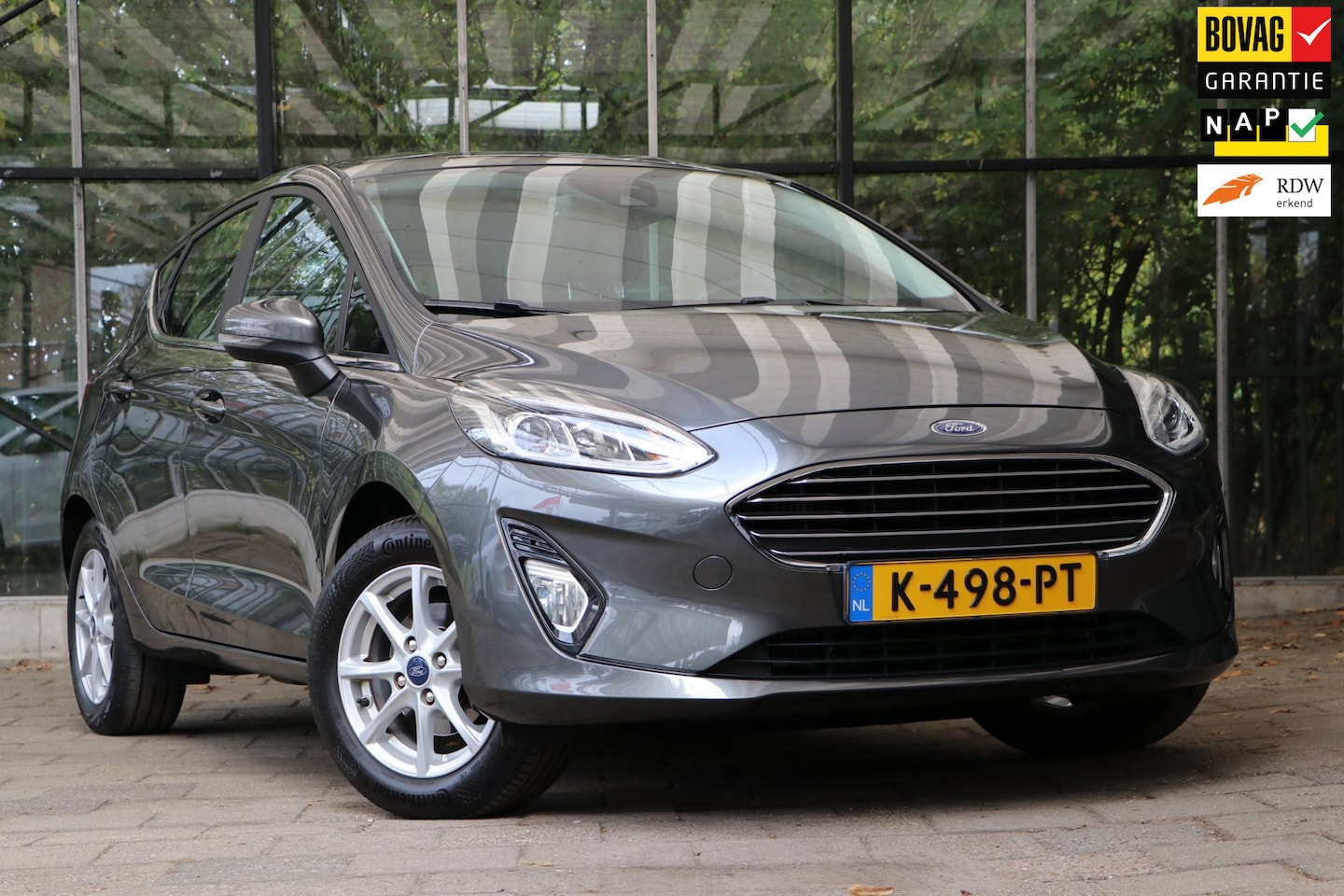 Ford Fiesta - 1.0 EcoBoost Titanium / Trekhaak / 12mnd Bovag garantie / All-in prijs! - AutoWereld.nl