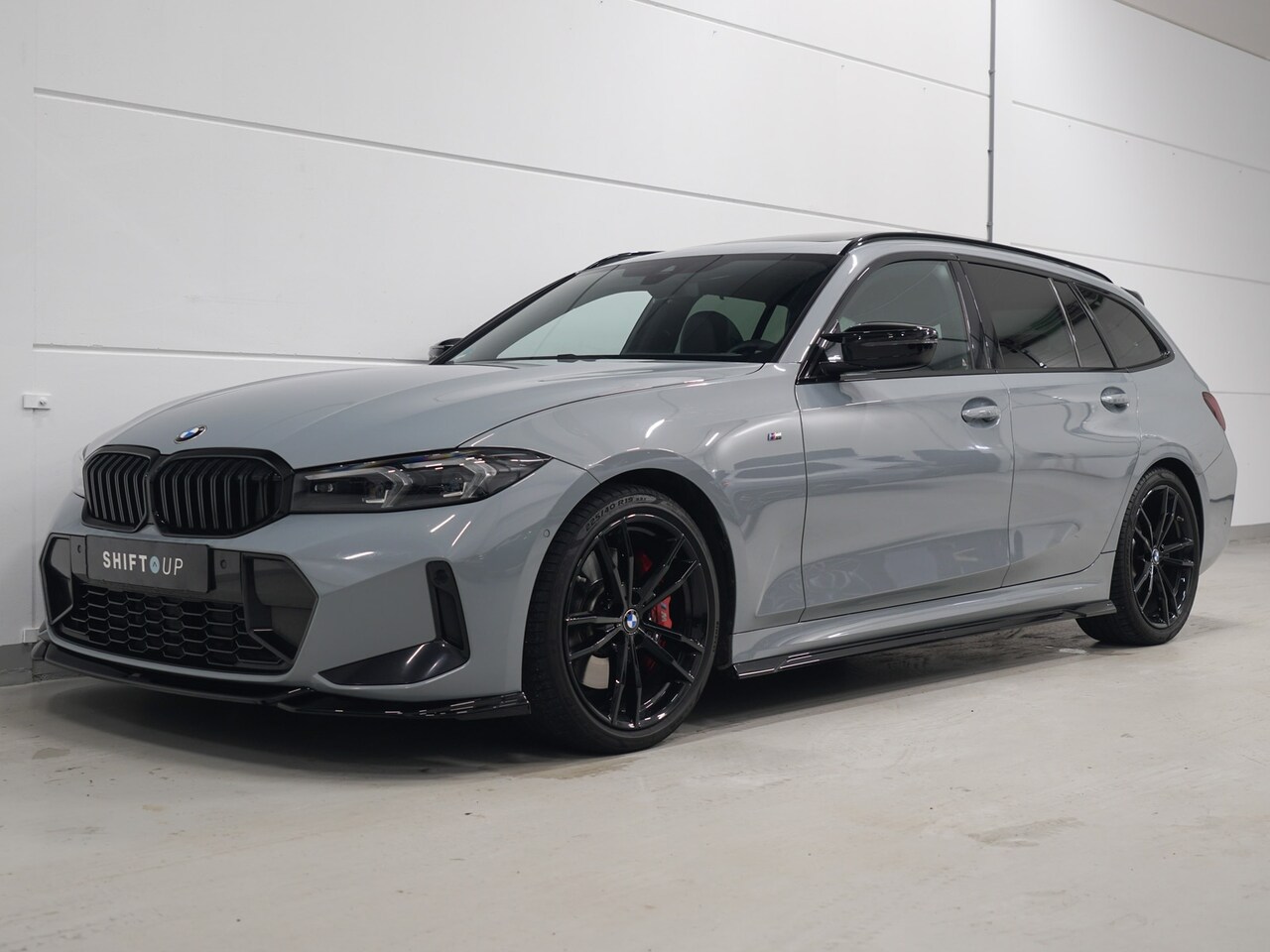 BMW 3-serie Touring - 320i M-Sport | Panoramadak | Harman Kardon | Stuurverwarming - AutoWereld.nl