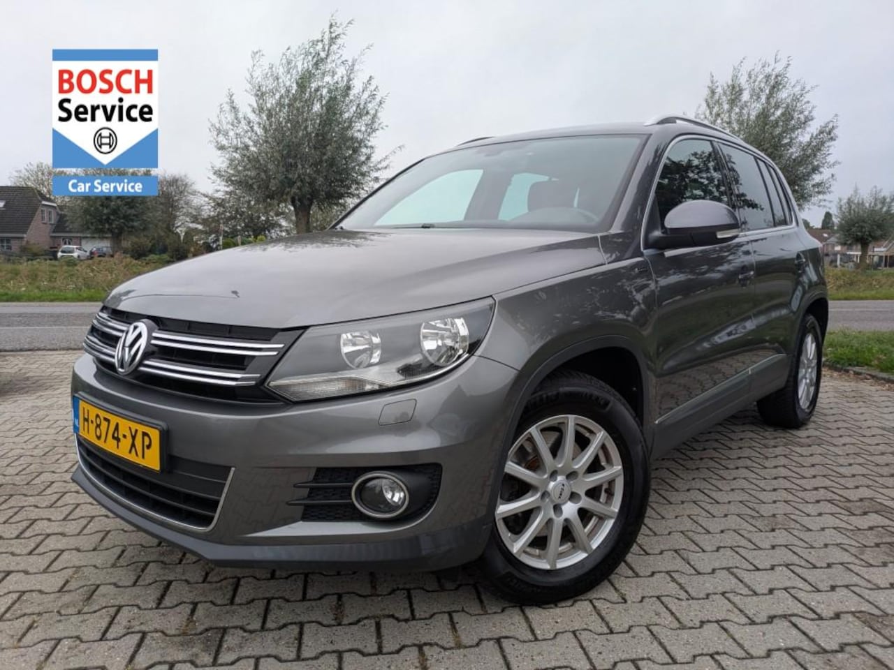 Volkswagen Tiguan - 1.4 TSI SportenStyle I DSG I Camera I Trekhaak I Clima I Cruise I Navi - AutoWereld.nl