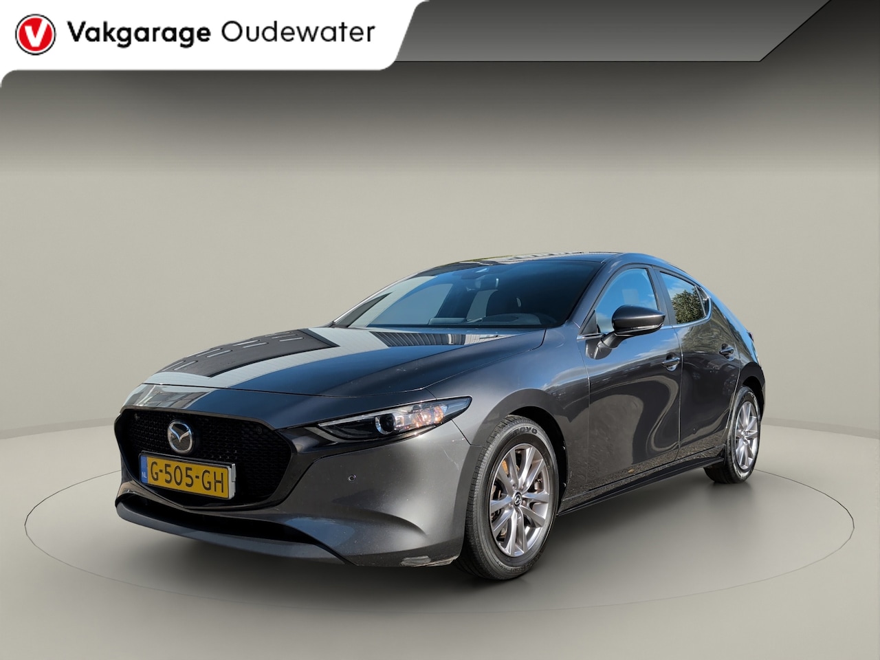 Mazda 3 - 2.0 e-SkyActiv-G M Hybrid 122 Comfort met Bose + Leer + camera + trekhaak - AutoWereld.nl