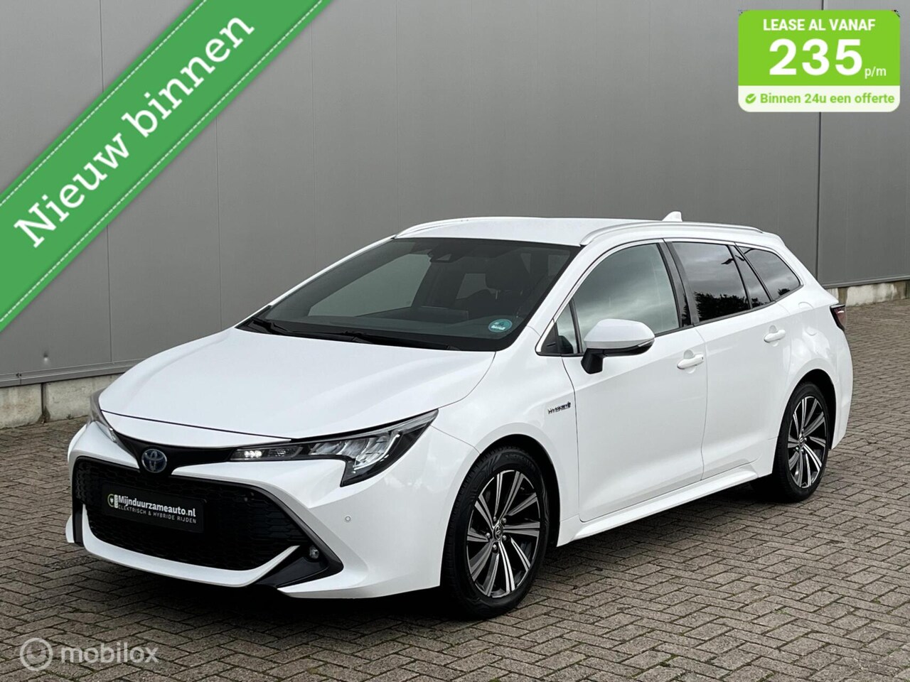Toyota Corolla Touring Sports - 2.0 Hybrid Aut,Trekhaak, Vol ! - AutoWereld.nl