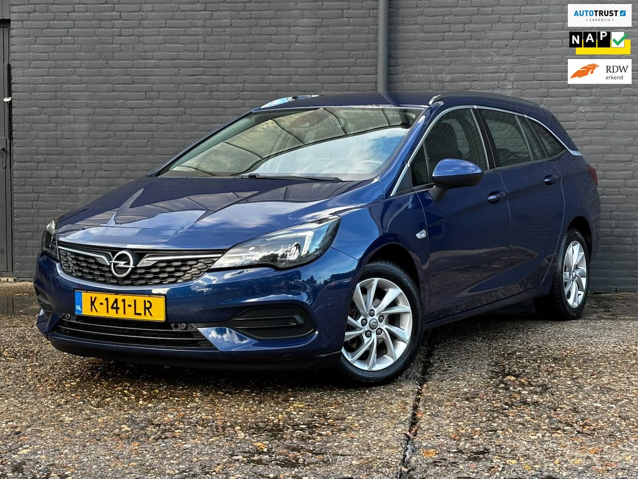 Opel Astra Sports Tourer - 1.2 Business Elegance CARPLAY|125550KM|KEYLESS|TREKHAAK|CAMERA|NAVI - AutoWereld.nl