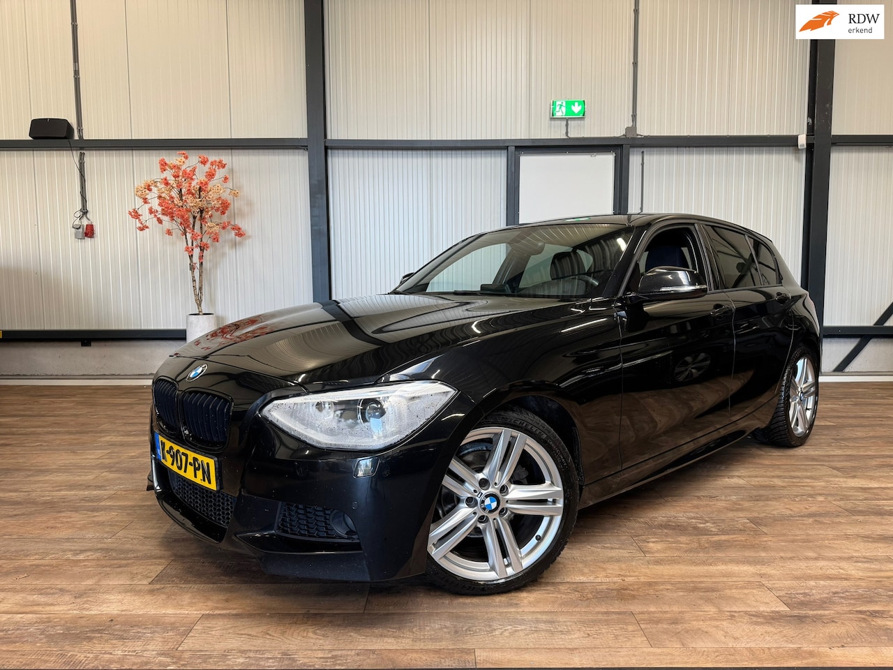 BMW 1-serie - 116i High Executive / NAVI /CLIMA / CRUISE / - AutoWereld.nl
