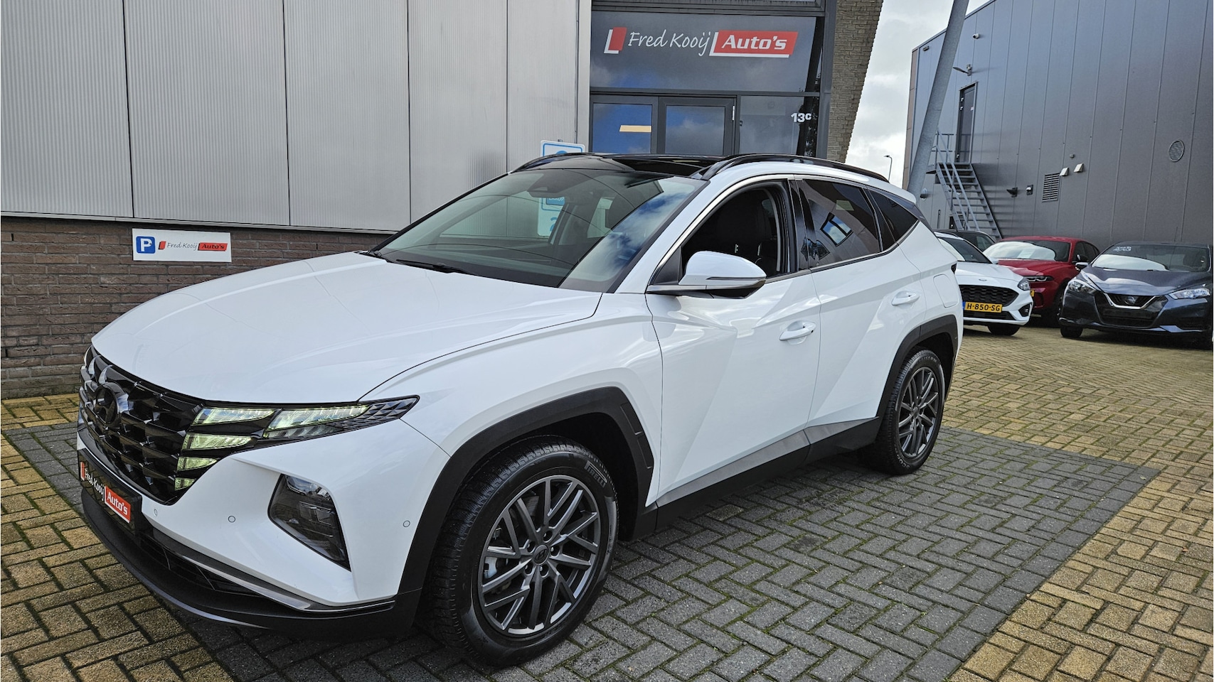 Hyundai Tucson - 1.6 T-GDI PHEV N Line Sky 4WD 1.6 T-GDI PHEV N Line Sky 4WD - AutoWereld.nl