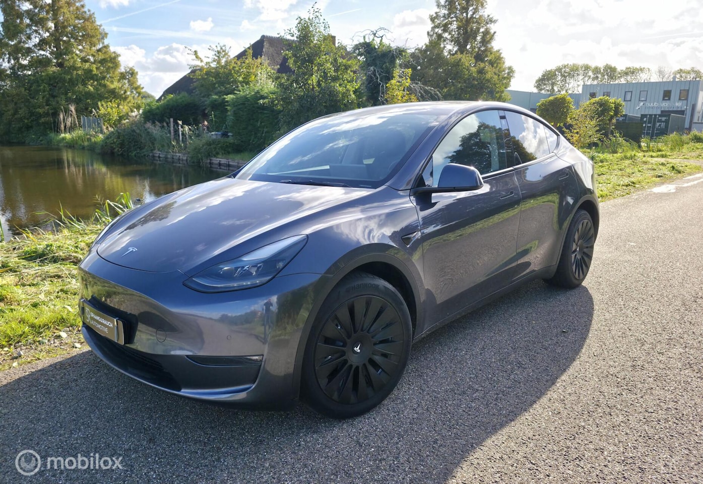 Tesla Model Y - Long Range AWD 75 kWh / Trekhaak / Leder - AutoWereld.nl