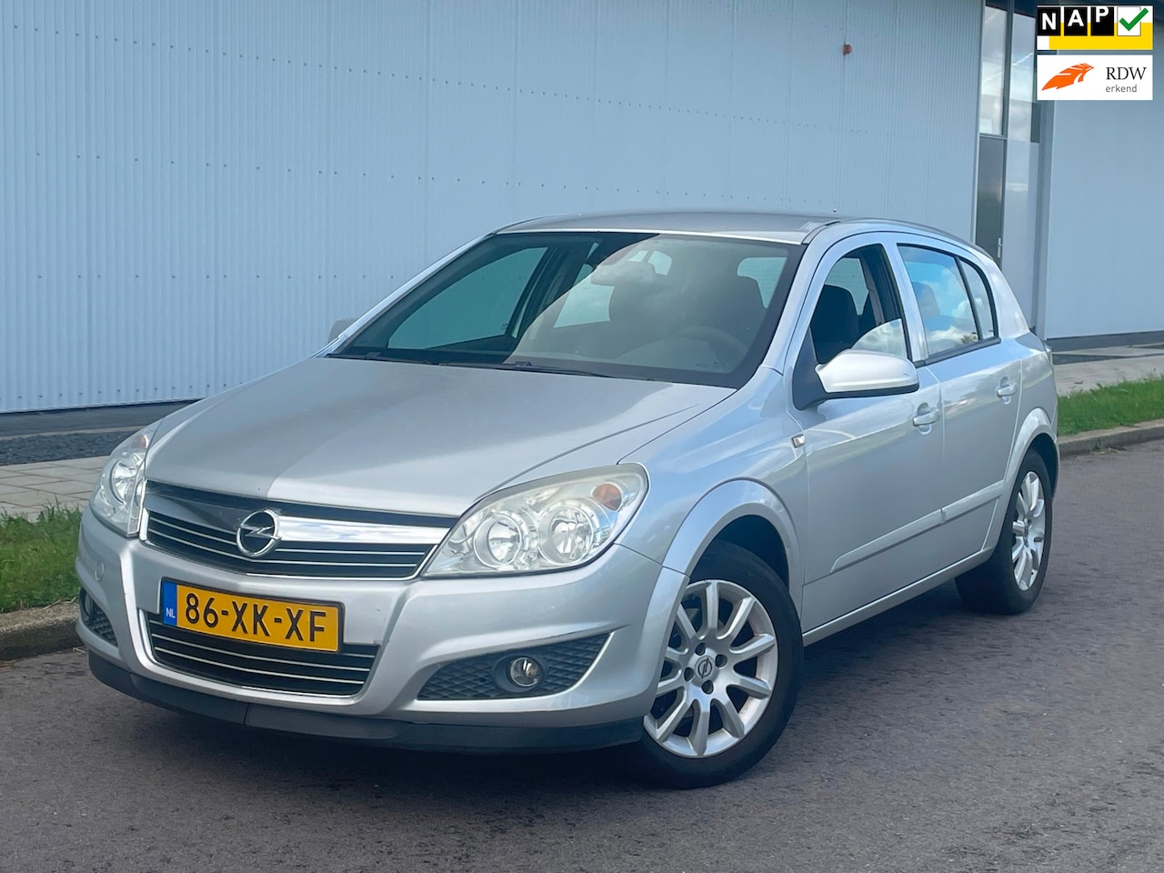 Opel Astra - 1.4 Temptation Airco Cruisecontrol Trekhaak - AutoWereld.nl
