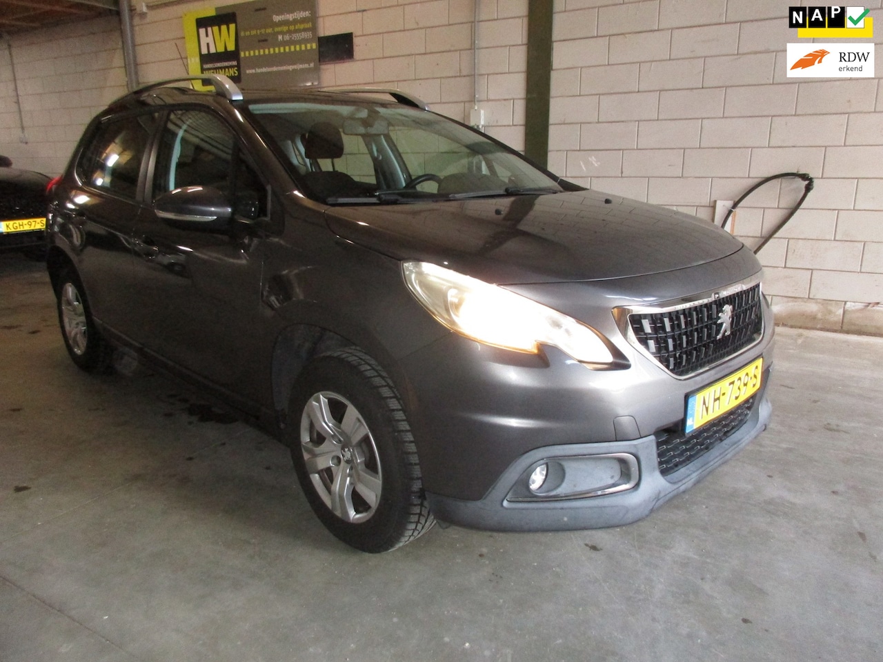 Peugeot 2008 - 1.2 PureTech Blue Lion 1.2 PureTech Blue Lion, panoramadak, Trekhaak - AutoWereld.nl