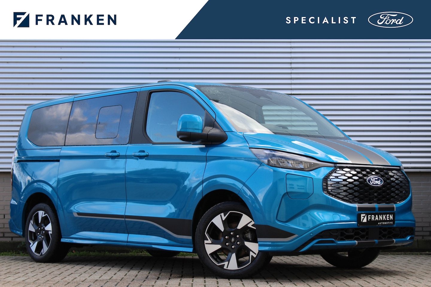 Ford E-Tourneo Custom - E-Custom 65 kWh Sport | Trekhaak | 8P | Panoramadak | BLIS | Full Options - AutoWereld.nl