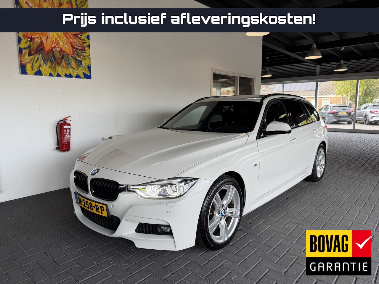 BMW 3-serie Touring - 318i M Sport Edition M Sport / stoelverwarming / extra set winterwielen / cruise control - AutoWereld.nl