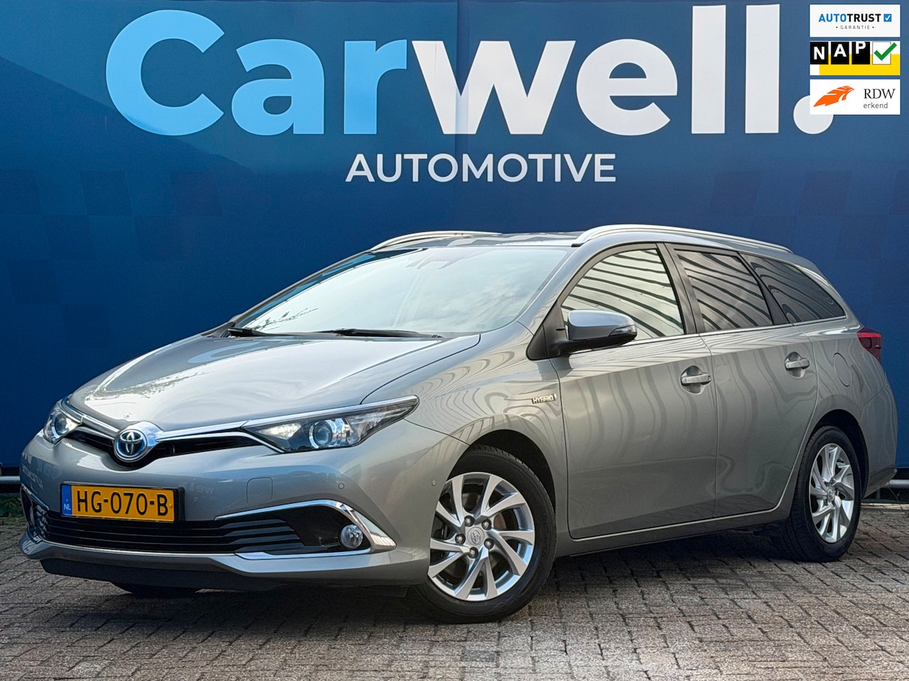 Toyota Auris Touring Sports - 1.8 Hybrid Executive|2e Eigenaar|StoelVW|Navi|Camera|Climate|Cruise|PDC|LMV|N.A.P|Apk tot - AutoWereld.nl