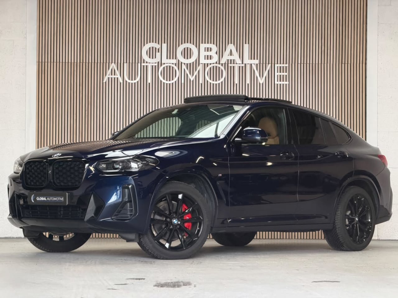 BMW X4 - XDrive30i High Executive M Sport - M Stoelen - Panoramadak - Tansanitblau - AutoWereld.nl
