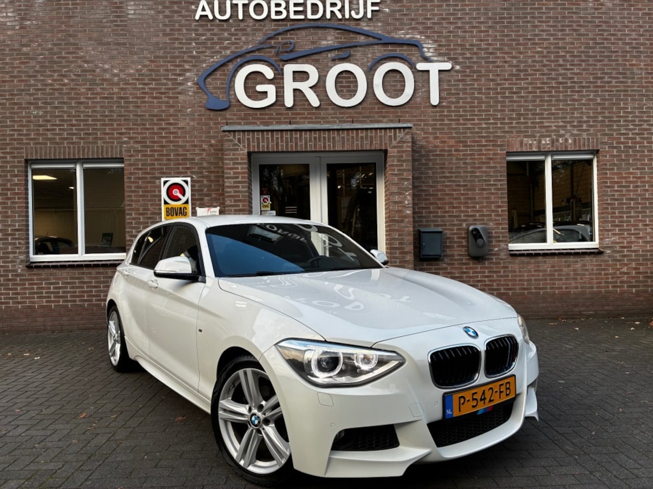 BMW 1-serie - 116I M SPORT H. EXE. - AutoWereld.nl
