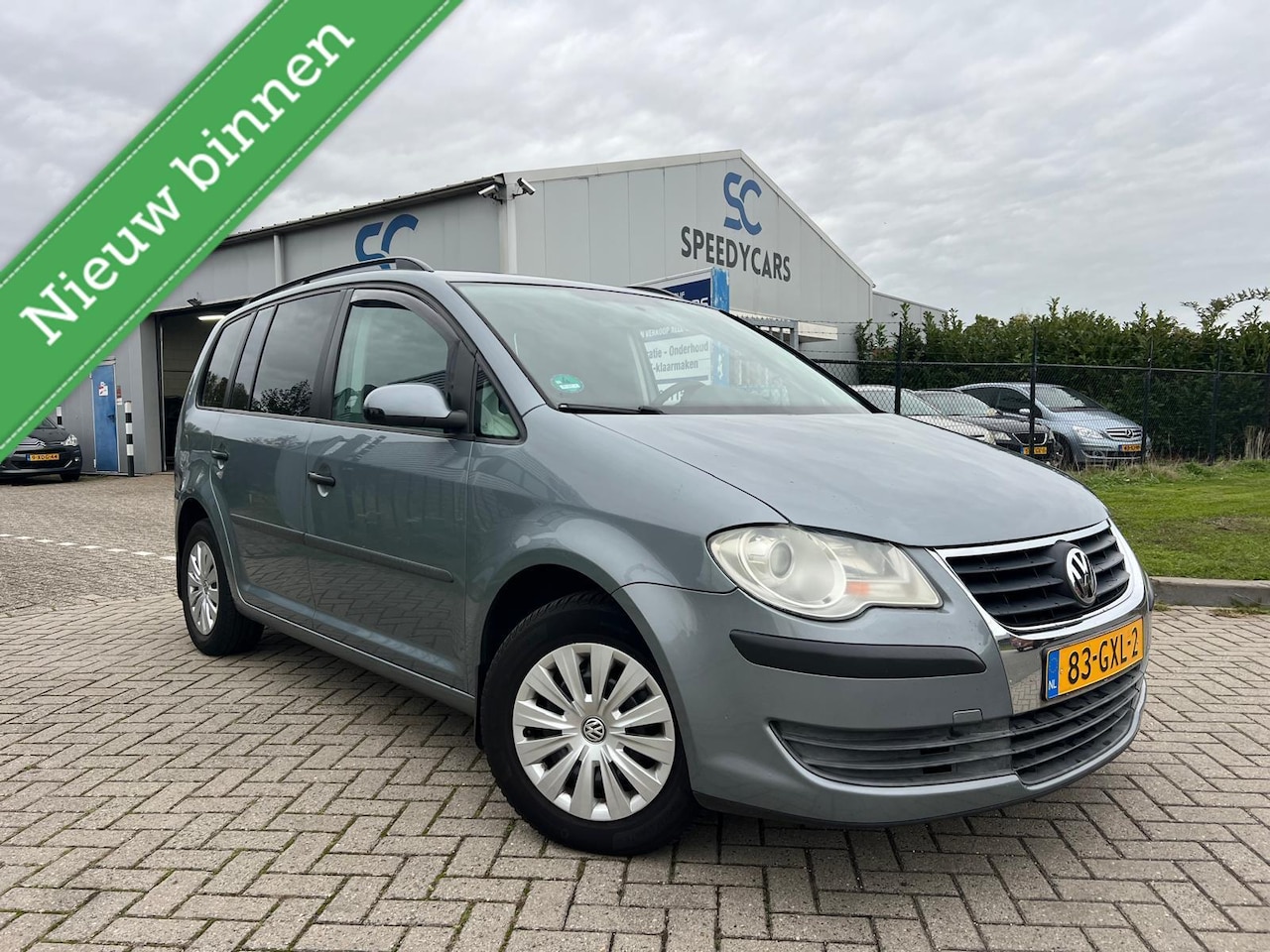 Volkswagen Touran - 1.4 TSI Optive Cruise Clima Trekhaak - AutoWereld.nl