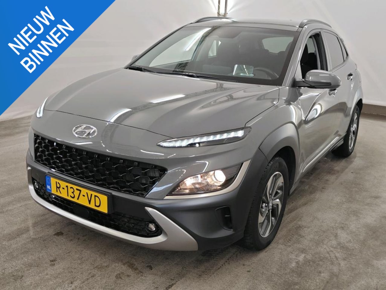 Hyundai Kona - 1.6 GDI HEV FASHION I AUTOMAAT I APPLE CARPLAY I P-CAMERA I ALL-SEASON BANDEN - AutoWereld.nl