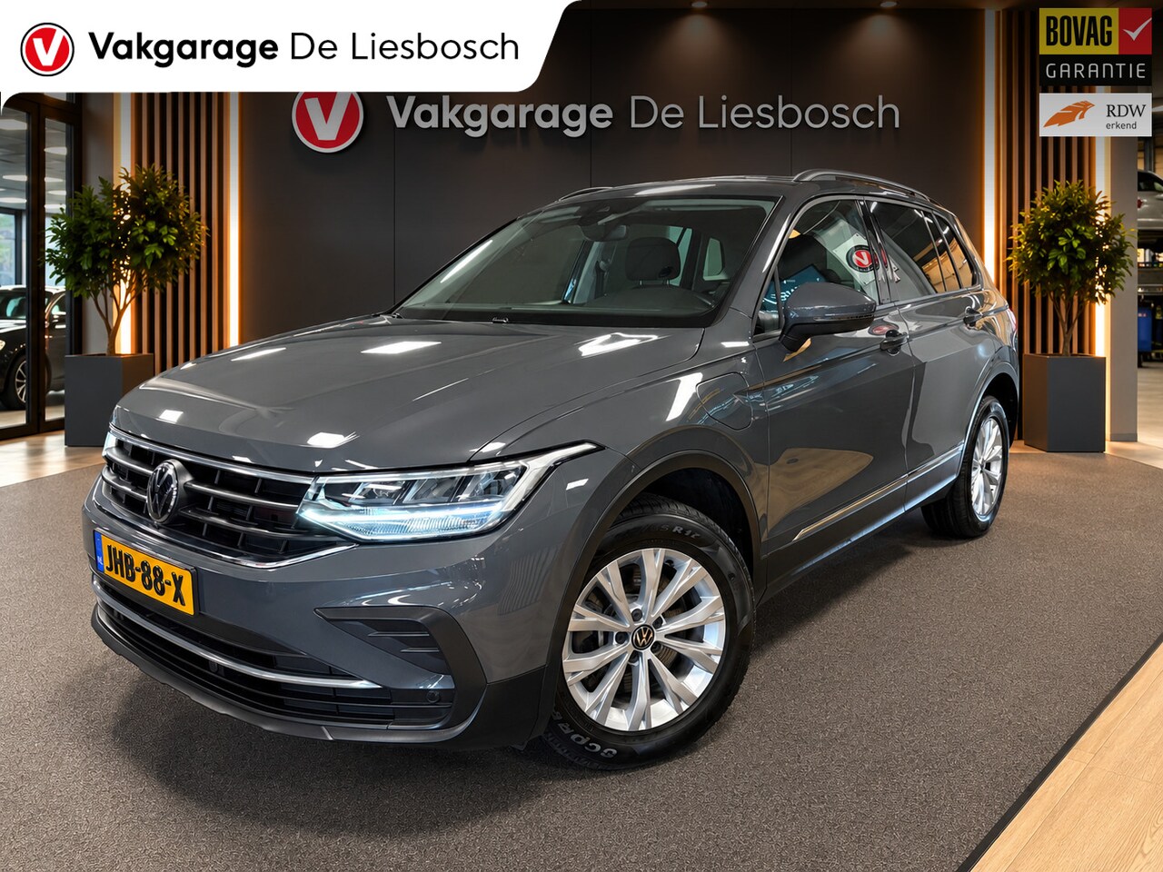 Volkswagen Tiguan - 1.4 TSI eHybrid comfort Business / navi / camera / carplay / boeken - AutoWereld.nl