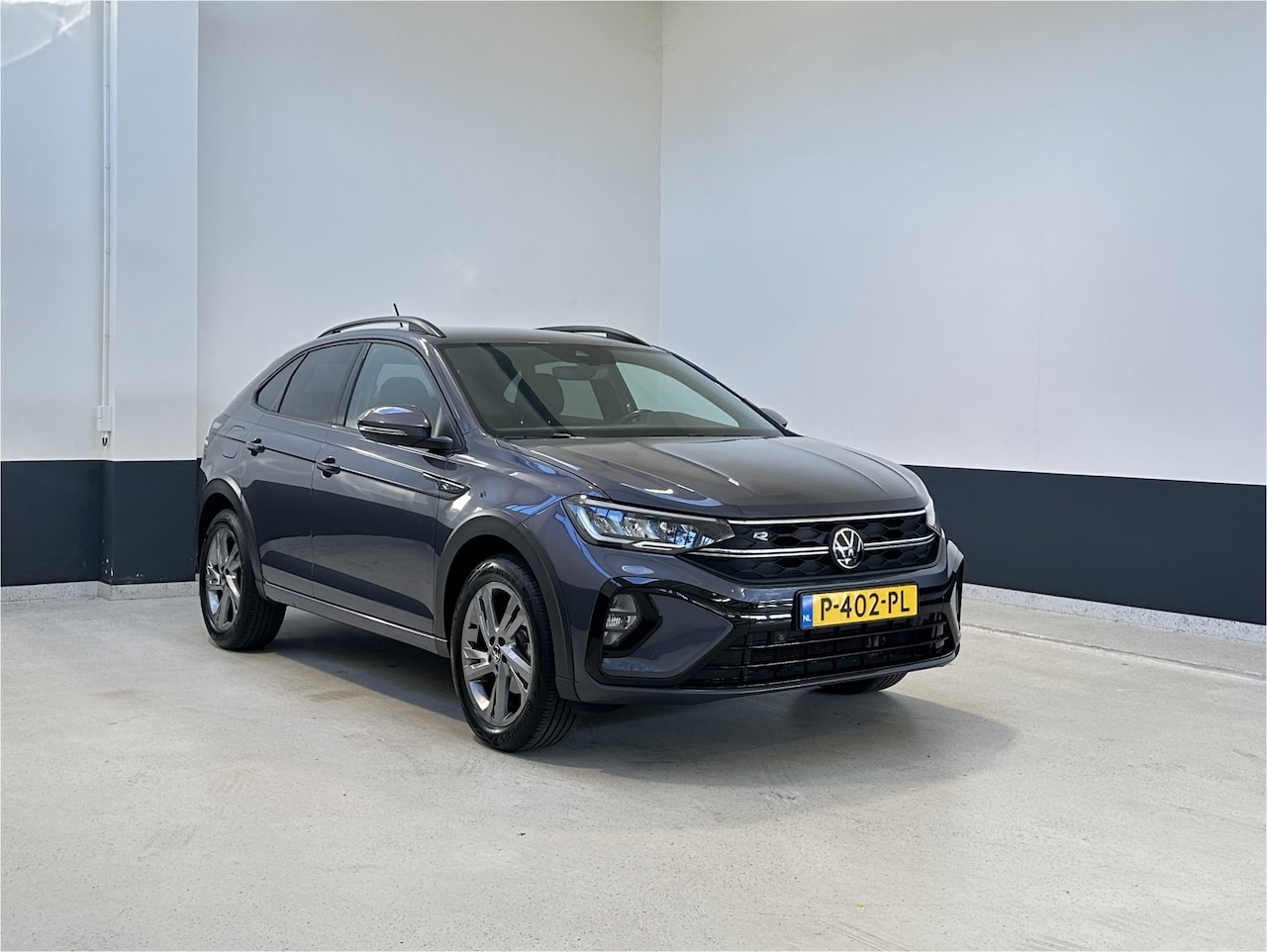 Volkswagen Taigo - 1.0 TSI R-Line Automaat | Apple Carplay/ Android Auto| Trekhaak | Stoel verwarming | NL | - AutoWereld.nl