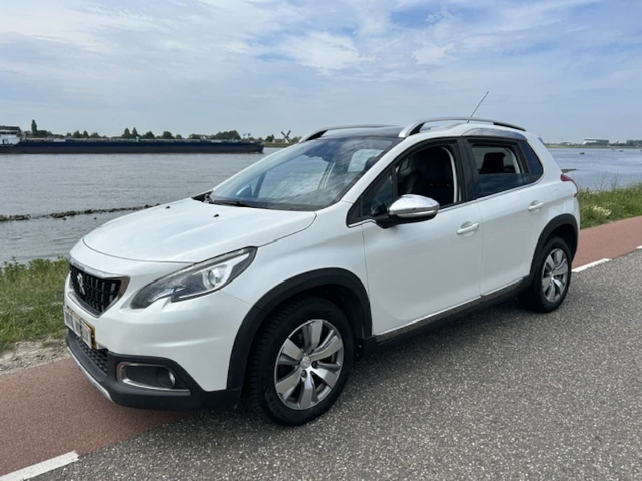 Peugeot 2008 - 1.2 automaat 2014 79.000 km Nap nwe Vredestein banden - AutoWereld.nl