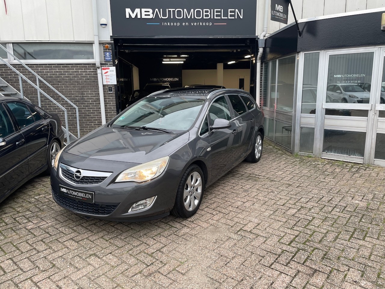 Opel Astra Sports Tourer - 1.4 Turbo Edition/Sport/Airco/Navi/Schuifdak/APK/Trekhaak/Vol Opties!! - AutoWereld.nl