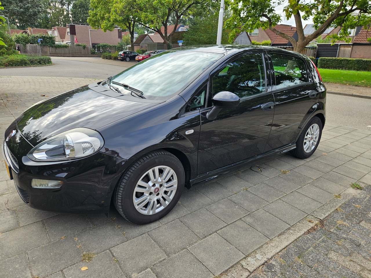 Fiat Punto Evo - 1.3 M-Jet Street Prachtige & Zuinige Fiat Punto Evo (2014) – Perfect Onderhouden! - AutoWereld.nl