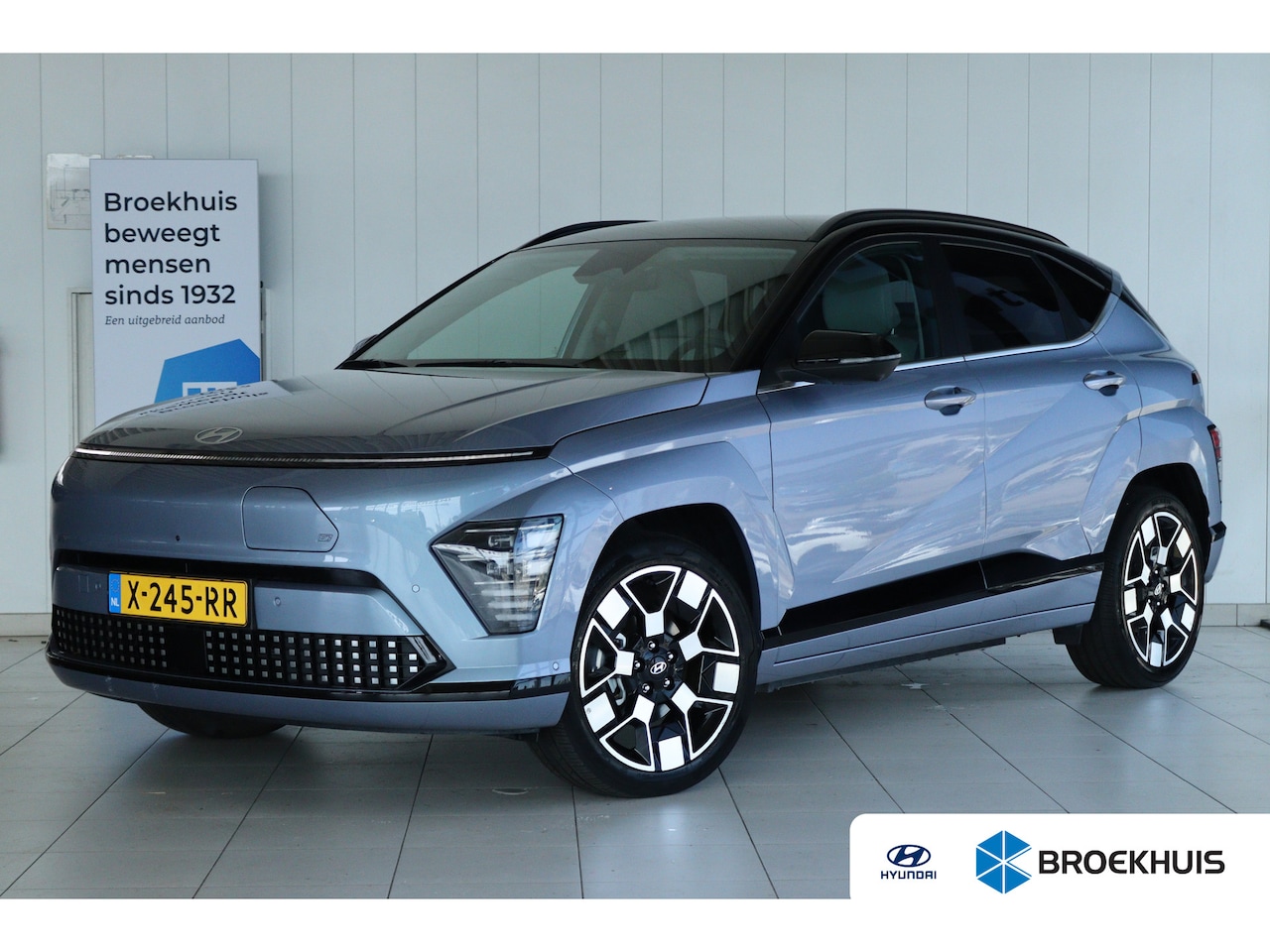 Hyundai Kona Electric - Premium 65.4 kWh | Achterspoiler | Achterstoelen verwarmd | Achteruitrijcamera - AutoWereld.nl
