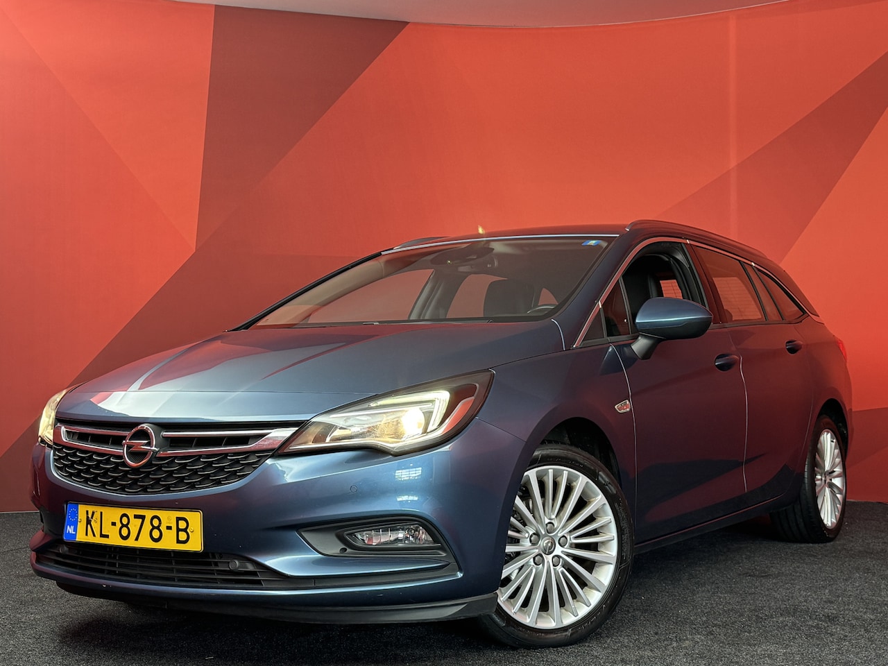 Opel Astra Sports Tourer - 1.0 Innovation | Nieuw Binnen! | Half leder | Cruise | Navi - AutoWereld.nl