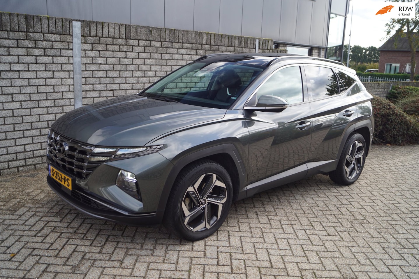 Hyundai Tucson - 1.6 T-GDI HEV Premium Sky 4WD Autom Panodak Leder Sportst Stoel/Stuur A Bankverw Navi Came - AutoWereld.nl