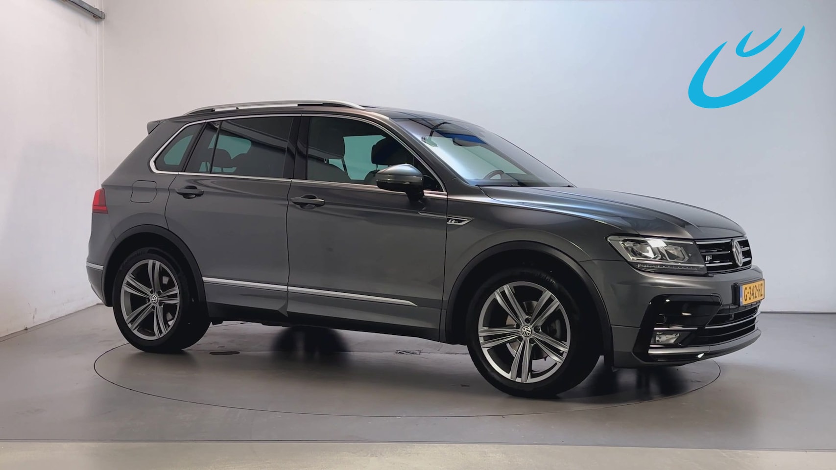 Volkswagen Tiguan - 1.5 TSI R-Line Highline Business Trekhaak Panoramadak Stoelverwarming DAB+ - AutoWereld.nl