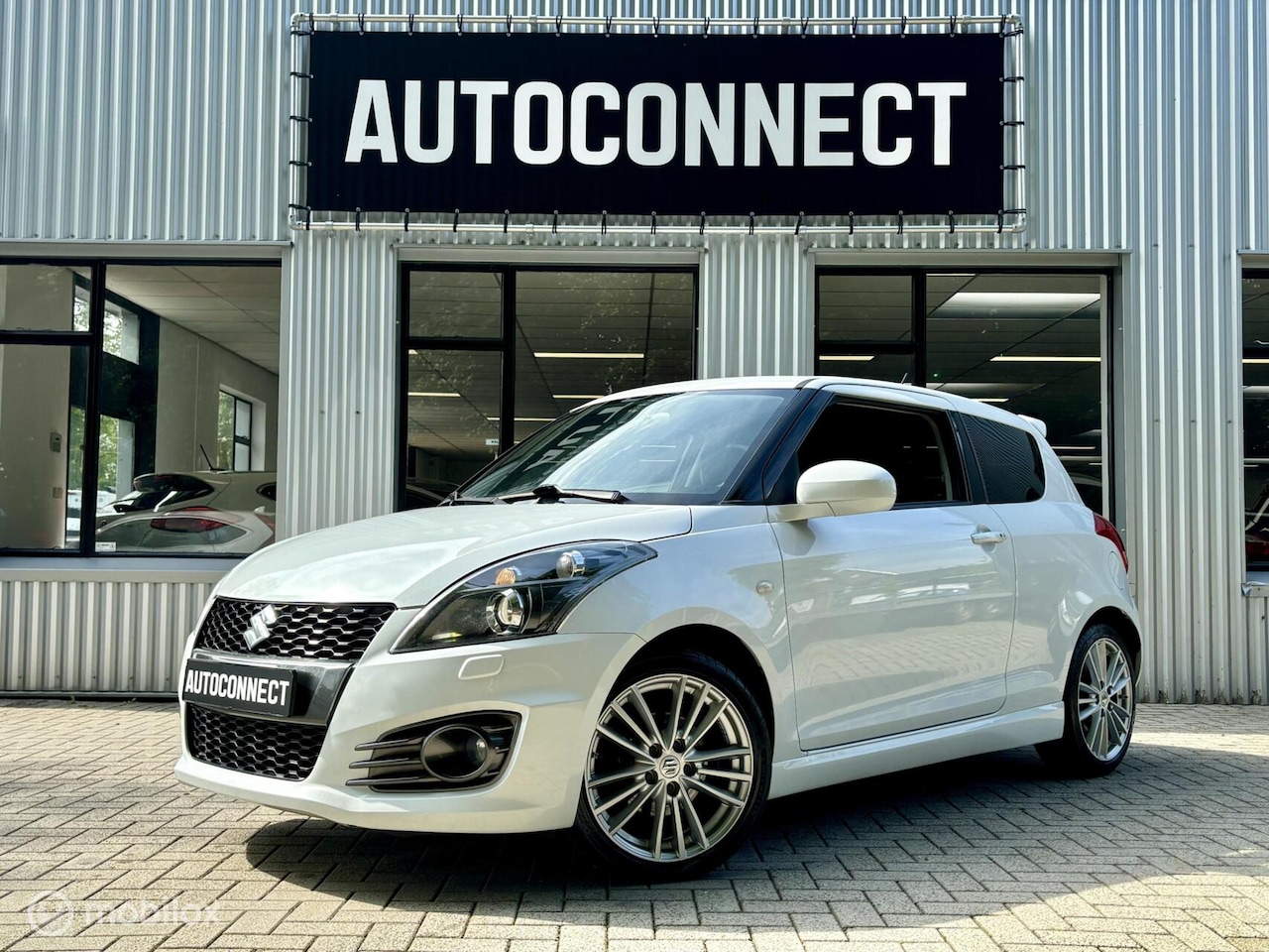 Suzuki Swift - 1.6 Sport 1.6 Sport. 136 PK, CRUISE, CLIMA, STOELVERWARMING. - AutoWereld.nl