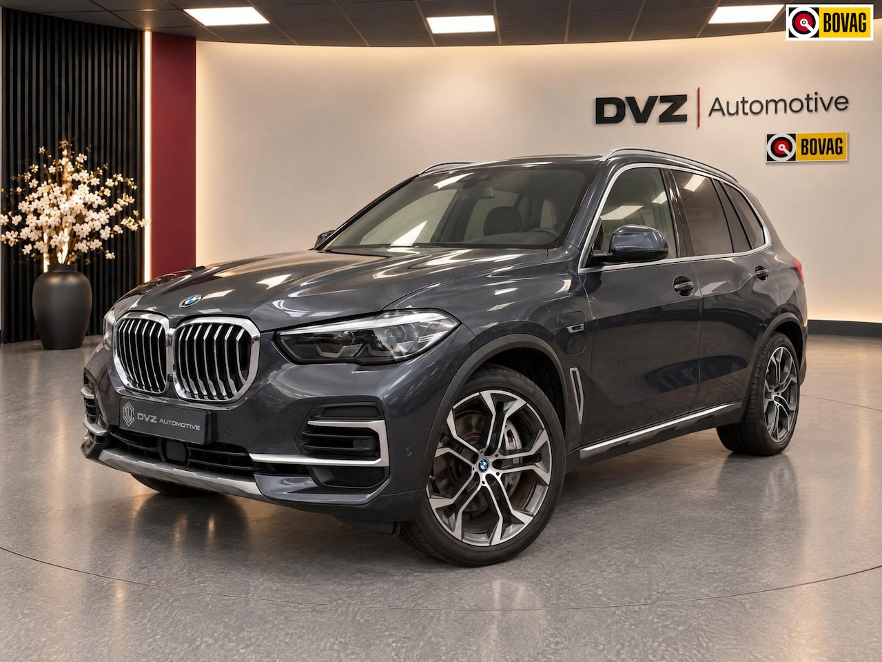 BMW X5 - XDrive45e 394PK High Executive | X-Line | SOH 98% | Luchtvering | Memory - AutoWereld.nl