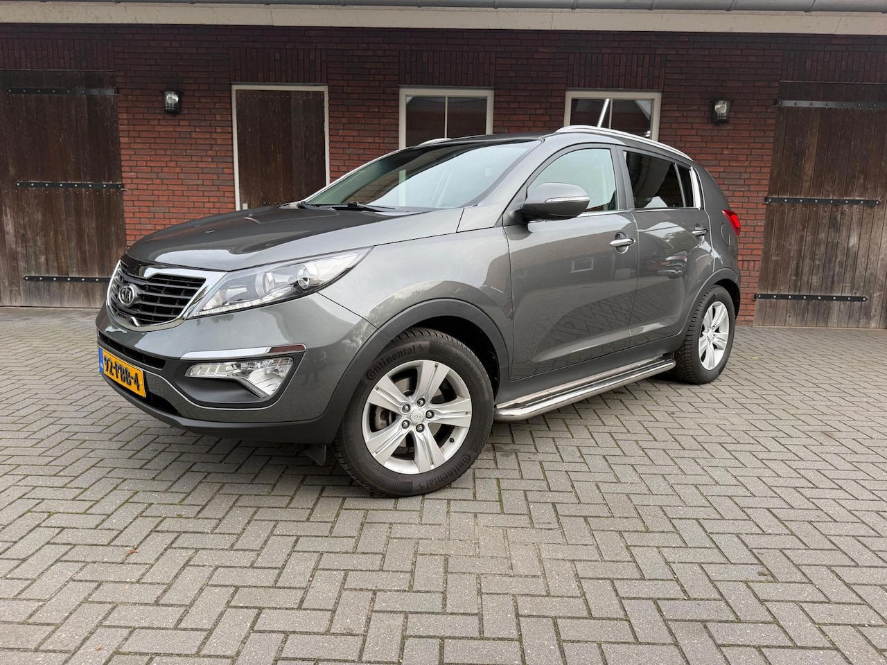 Kia Sportage - 2.0 X-ecutive Plus Pack |1900kg Trekgewicht| Sidestep| Top staat! - AutoWereld.nl