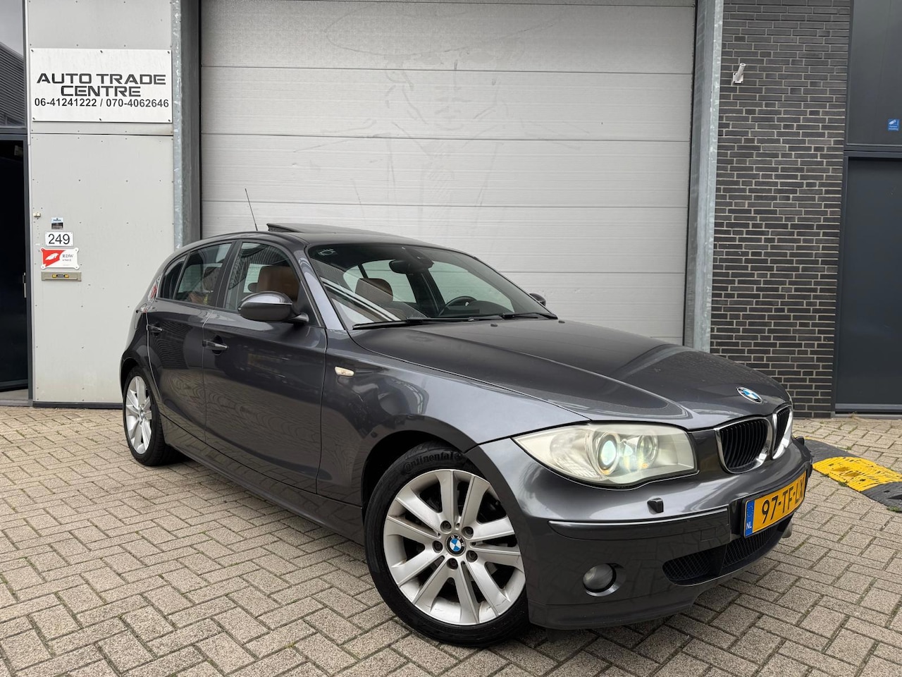 BMW 1-serie - 120i Graphite [Open dak | Stoel VW | Xenon | Cruise | PDC | Leder] - AutoWereld.nl