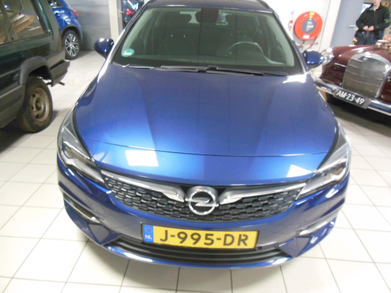 Opel Astra Sports Tourer - 1.4 Business Edition AUTOMAAT Staat in De Krim - AutoWereld.nl