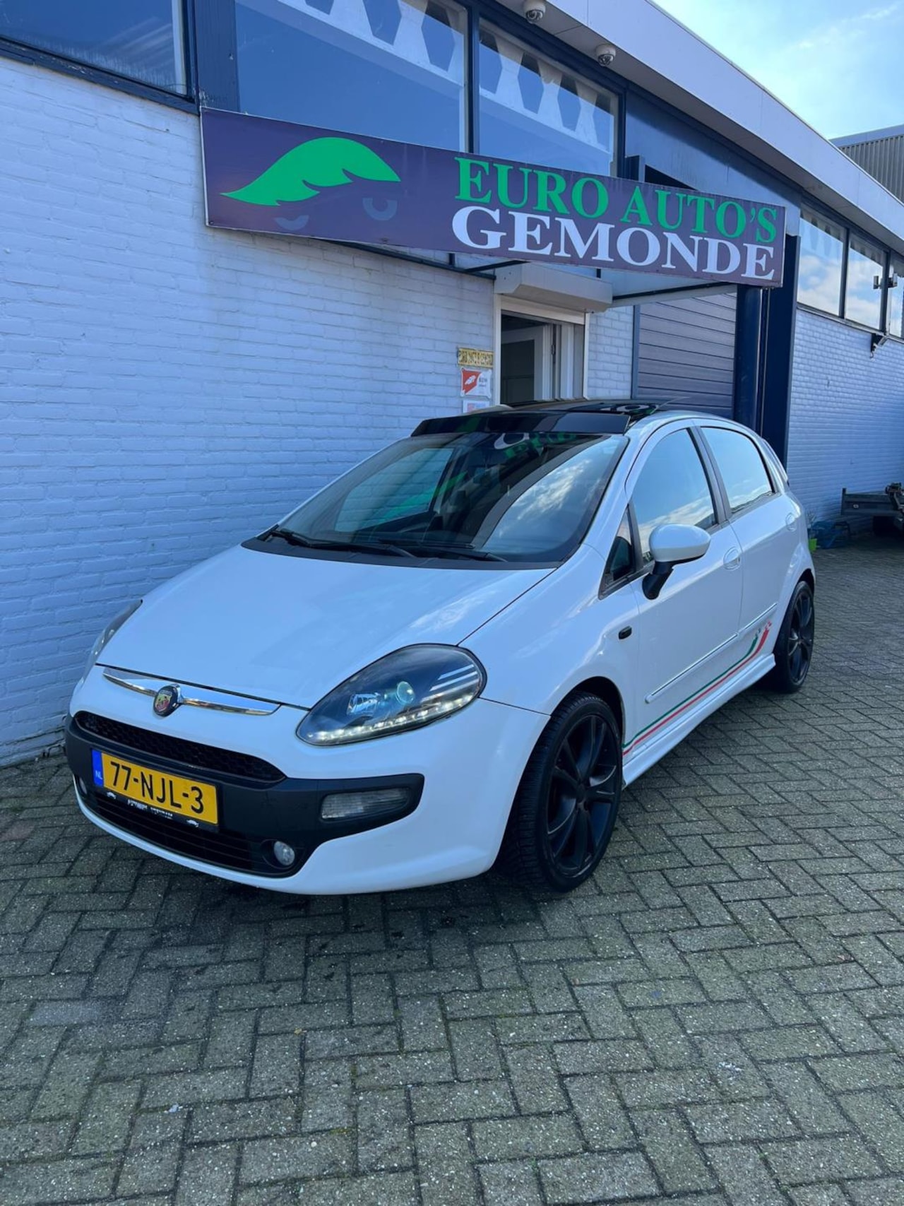 Fiat Punto Evo - 1.3 M-Jet Dynamic l Xenon l Panorama dak l - AutoWereld.nl