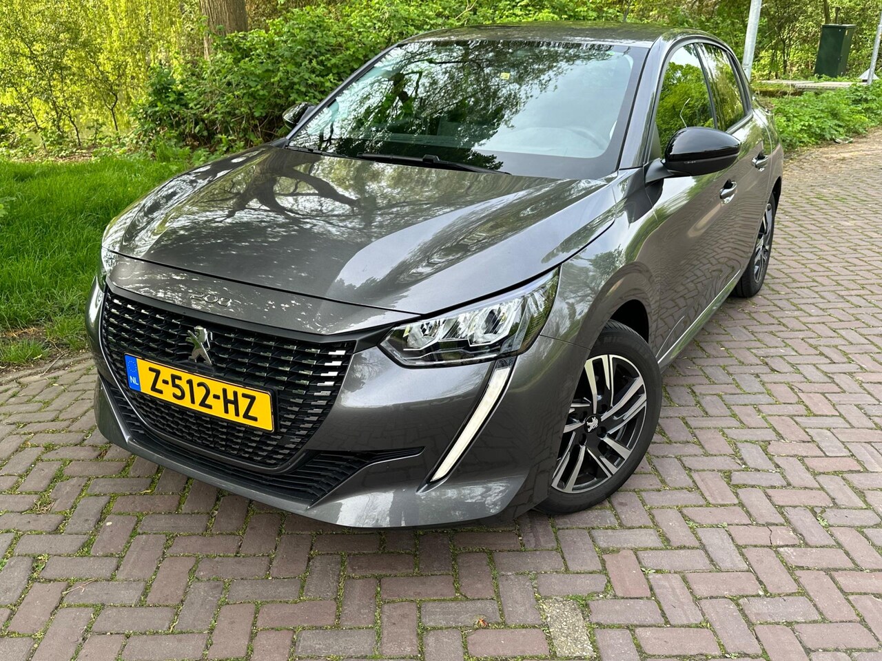 Peugeot 208 - 1.2 PureTech Allure Pack 1 Eig. b.j.2-2023 11000 km Led verl.Apple carplay 16"lm Velgen - AutoWereld.nl