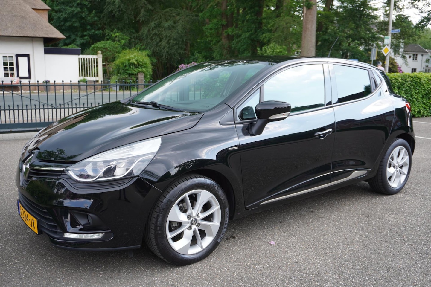 Renault Clio - 1.2 TCe Intens Airco Navi Cruise Pdc - AutoWereld.nl