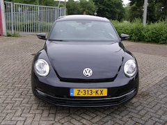 Volkswagen Beetle - 1.2 TSI Design BlueMotion met navigatie en cruise en dual climate climate control