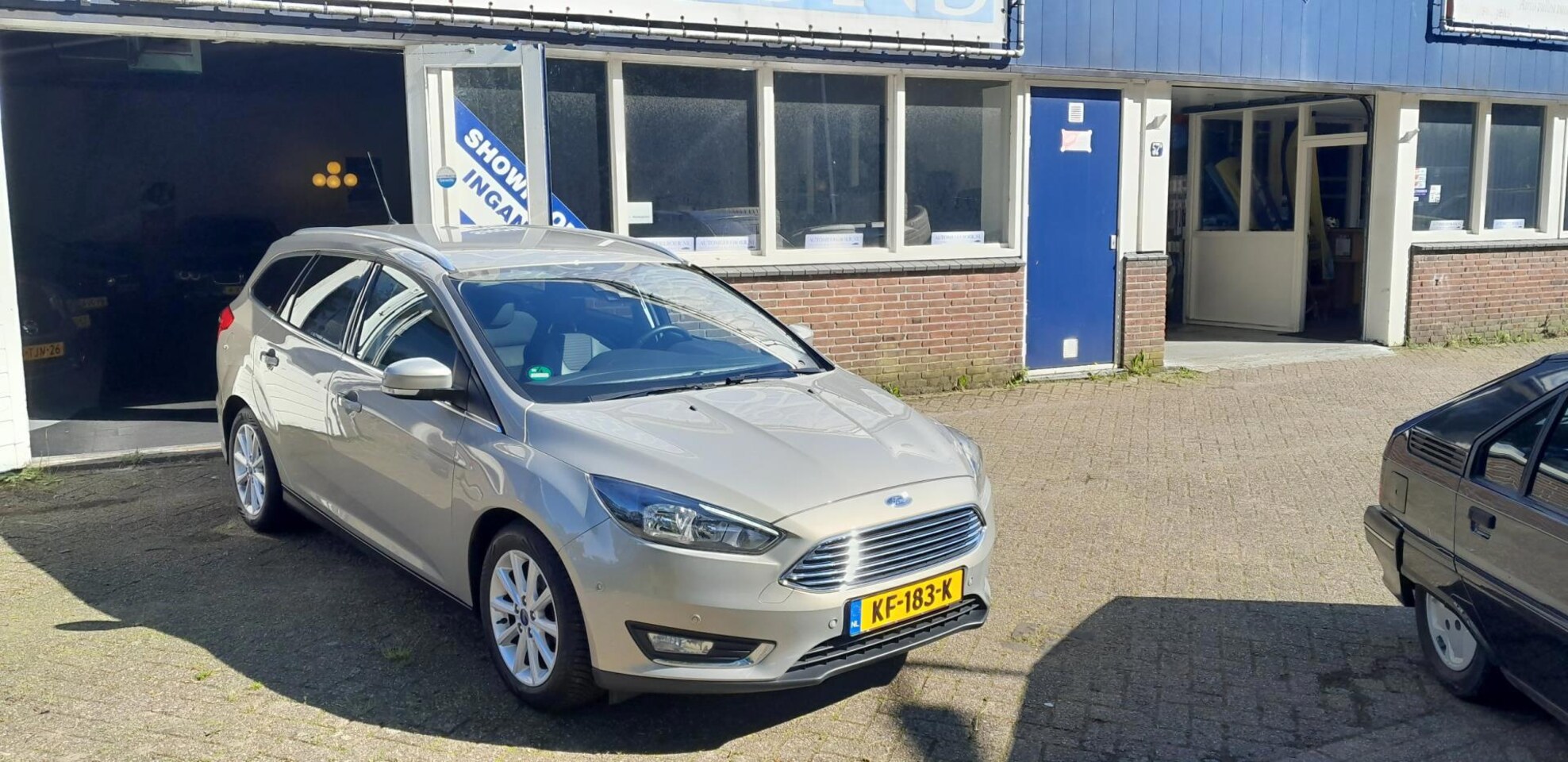 Ford Focus Wagon - 1.0 Titanium Leer Trekhaak full option dealeronderhouden - AutoWereld.nl